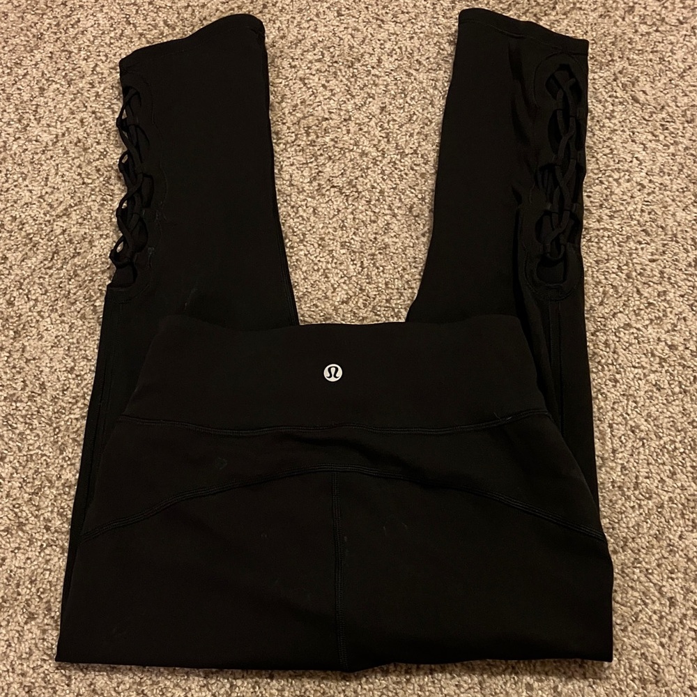 Lululemon Tied to It Crop Black Leggings Size 4 (S) with cross cross mesh detail